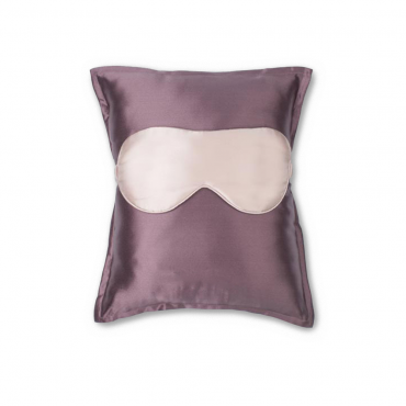 pink silk pillow and eye mask